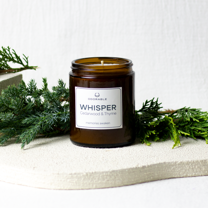 WHISPER-scented candle
