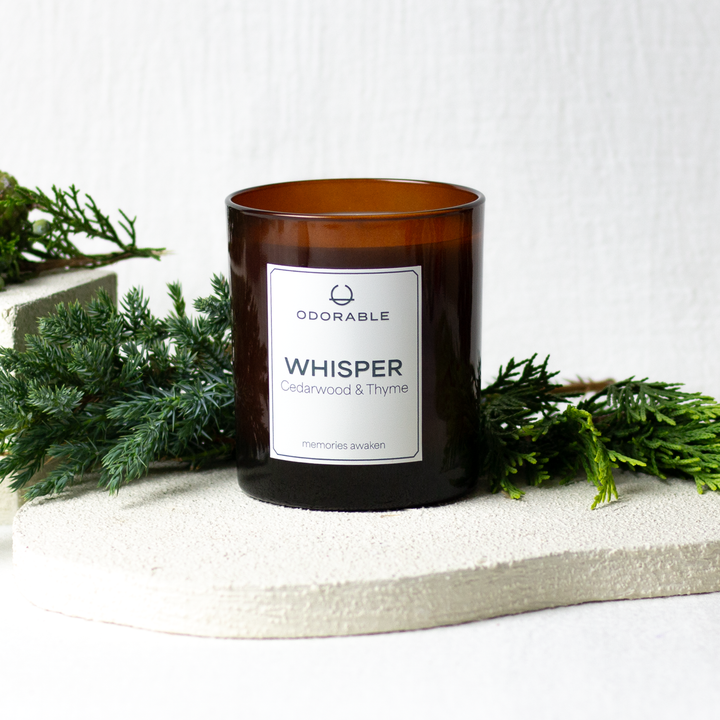 WHISPER-scented candle